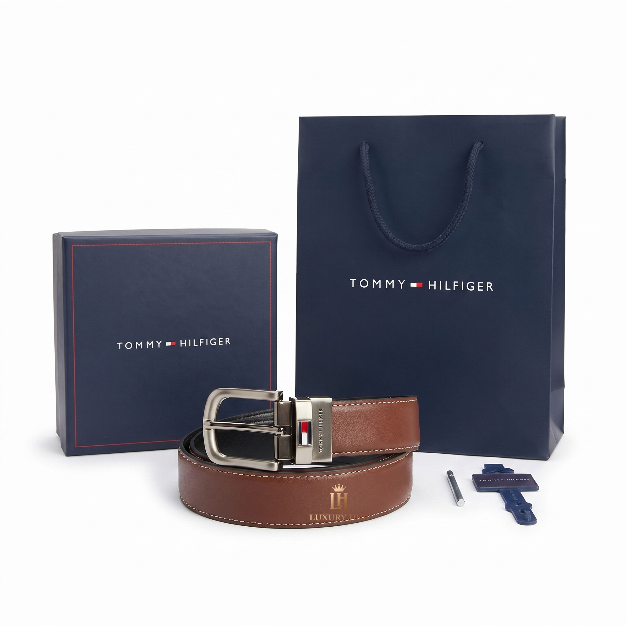 Professional standing view of the Tommy Hilfiger mirror original reversible leather belt featuring the polished silver buckle