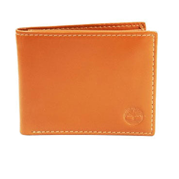 Studio product photograph of the Timberland mirror original wheat tan smooth leather bifold wallet highlighting the round silver metal tree hardware logo corner accent