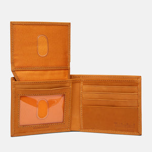 Studio interior view of the opened Timberland smooth wheat tan leather bifold wallet showcasing symmetrical multi-card slots and premium stitched edges