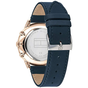 Left side perspective of the gold case and detailed stitching on the blue leather strap of the Tommy Hilfiger Cooper watch