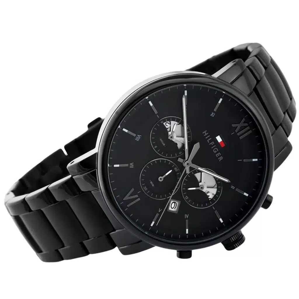 Detailed side view of the black crown and pushers on the Tommy Hilfiger 1710410