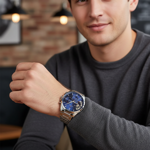 Male model wearing Tommy Hilfiger 1710448 silver watch with a smart business casual outfit