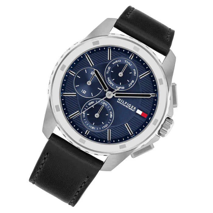 Angled view of Tommy Hilfiger 1710619 highlighting the polished silver case and premium black leather strap
