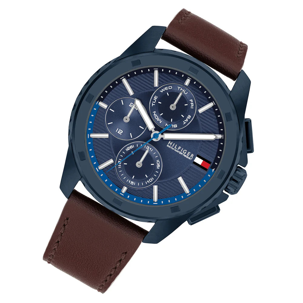 Angled view of Tommy Hilfiger 171063 highlighting the polished blue case and premium brown leather strap