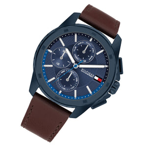 Angled view of Tommy Hilfiger 171063 highlighting the polished blue case and premium brown leather strap