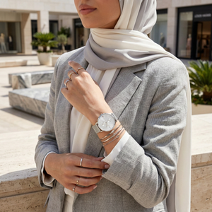 Woman wearing Tommy Hilfiger Jenna silver mesh watch for an elegant and chic modern look