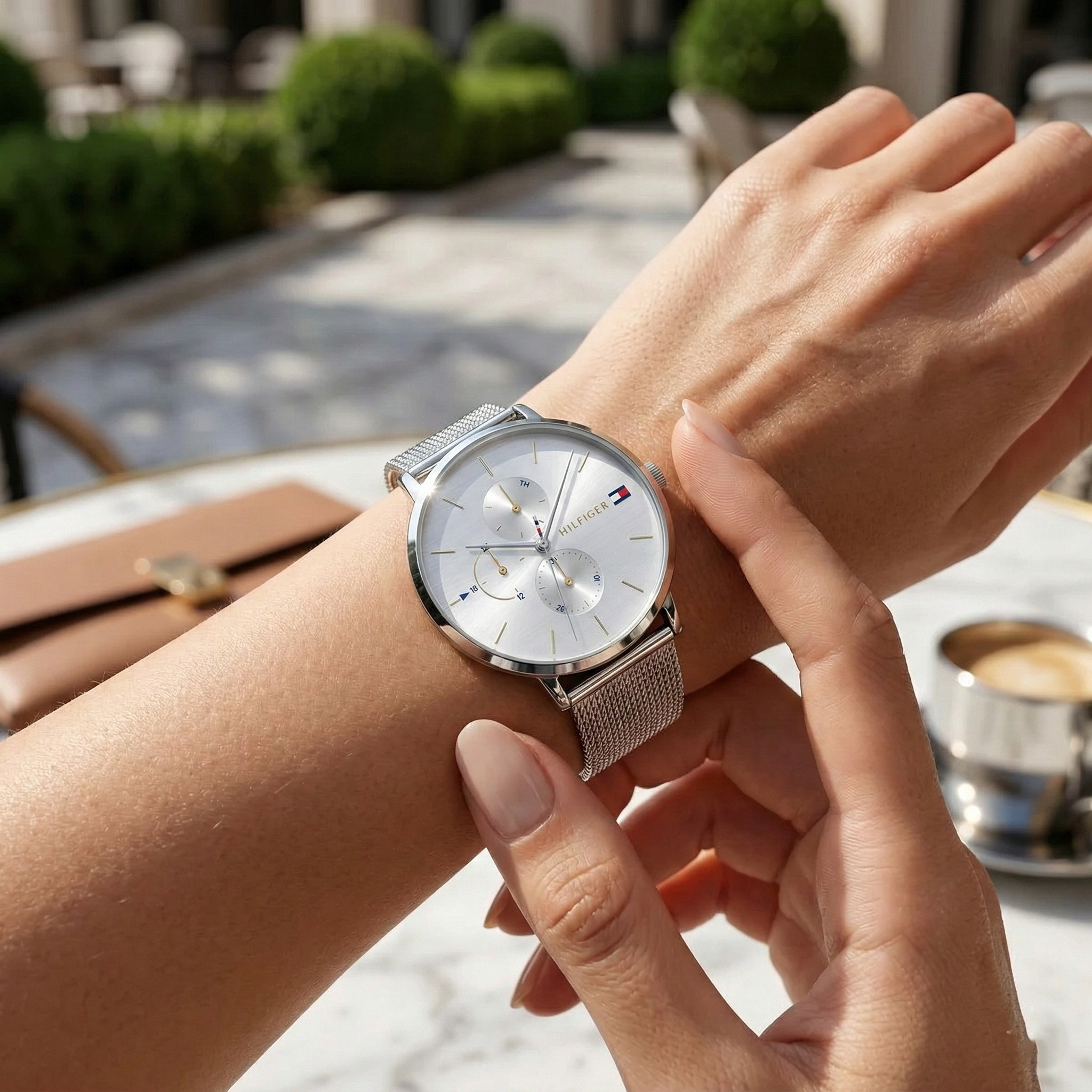 Close up shot of Tommy Hilfiger 1781942 on wrist showing the white textured dial and multi-function sub-dials