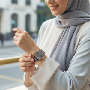 Female model wearing Tommy Hilfiger Jenna 1782300 two-tone watch with a contemporary outfit