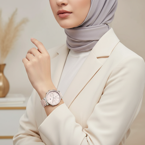 Female model wearing Tommy Hilfiger 1782343 pink rubber watch with a stylish casual outfit