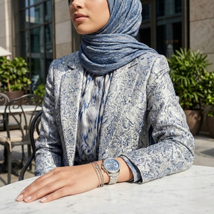 Woman wearing Tommy Hilfiger Lori silver stainless steel watch for an elegant and professional daily look