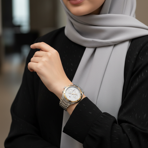 Female model wearing Tommy Hilfiger 1782573 two-tone watch with a sporty chic modern outfit