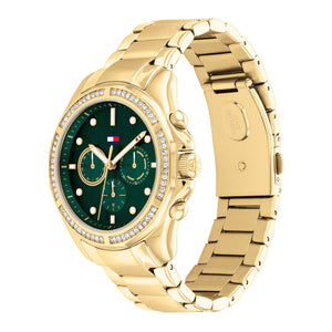 Angled view of Tommy Hilfiger 1782614 highlighting the polished gold-tone case, green dial, and crystal bezel