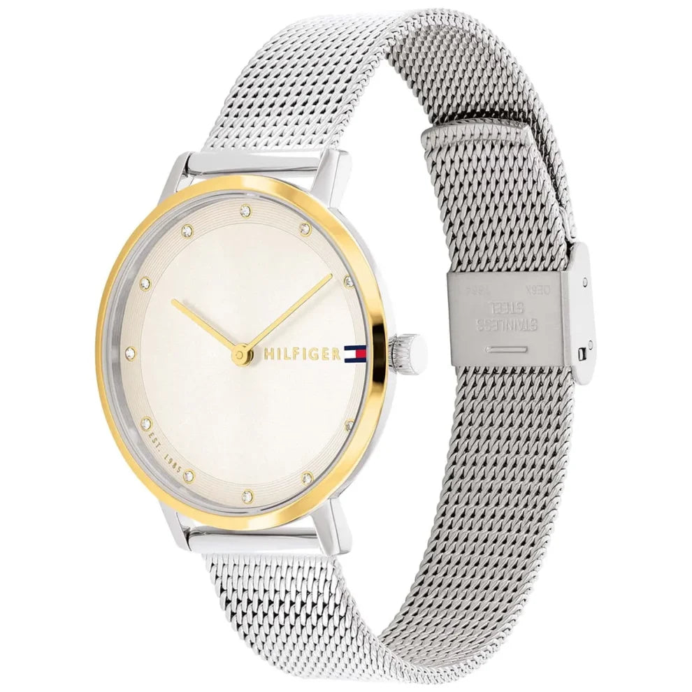 Angled view of the Tommy Hilfiger 1782667 highlighting the gold-tone bezel and silver-tone case