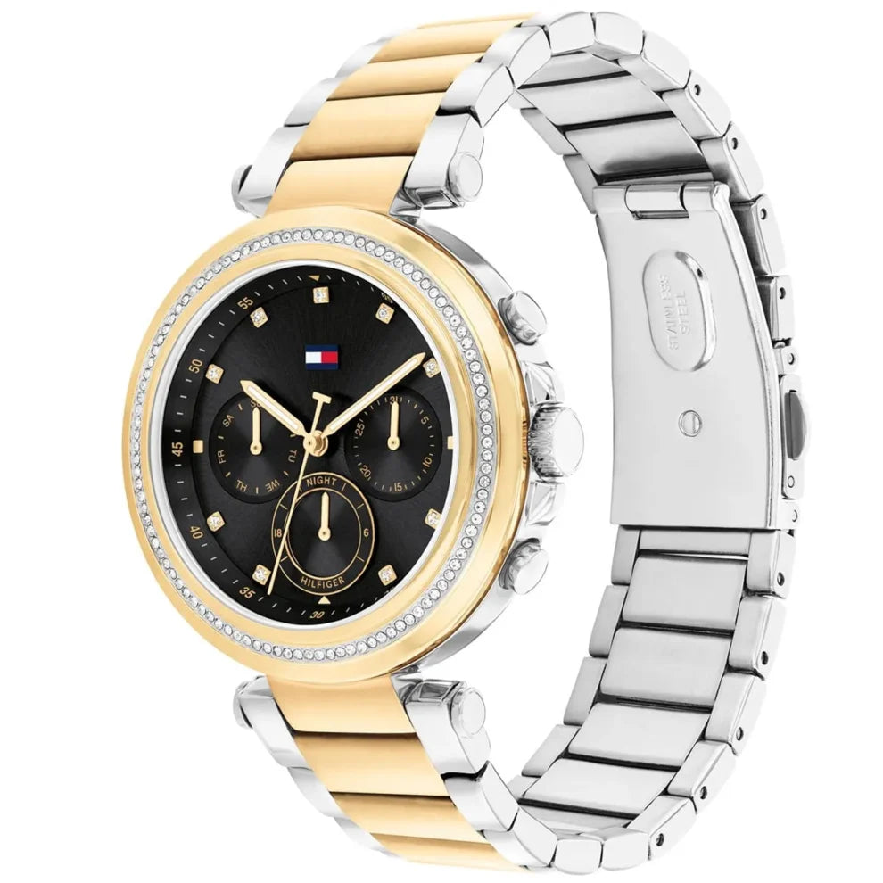 Angled view of the Tommy Hilfiger 1782702 highlighting the polished two-tone links and gold bezel