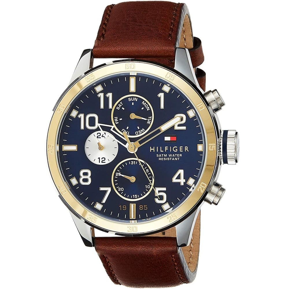 Angled view of the Tommy Hilfiger 1791137 highlighting the silver case and gold bezel contrast