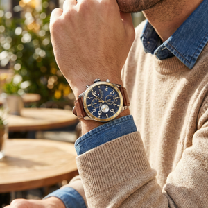 Male model wearing Tommy Hilfiger 1791137 two-tone watch with a casual outfit