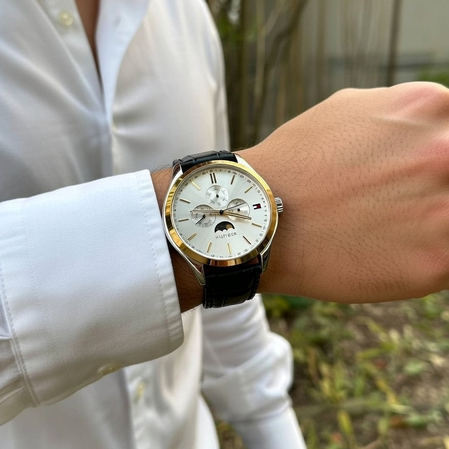 Male model wearing Tommy Hilfiger 1791305 watch with a formal suit