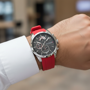 Close up shot of Tommy Hilfiger 1791351 watch on wrist showing the black dial and red details