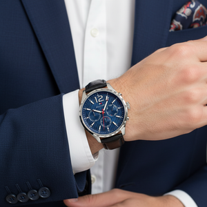 Male model wearing Tommy Hilfiger 1791468 silver watch with a casual outfit