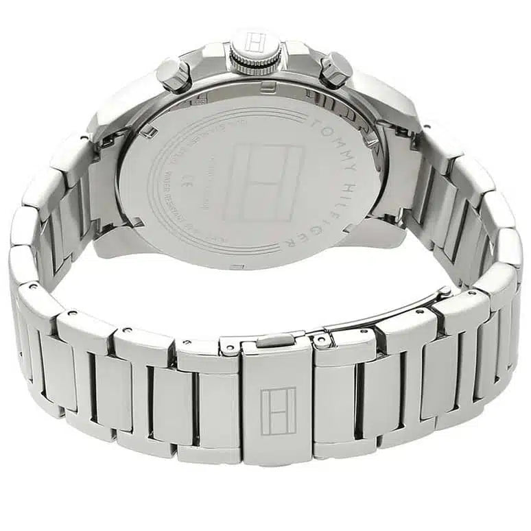 Left side perspective of the silver case and sporty bezel details of the Tommy Hilfiger watch