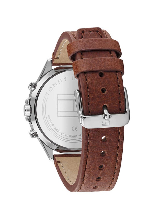 Angled view of the Tommy Hilfiger 1791710 highlighting the polished silver case and crown