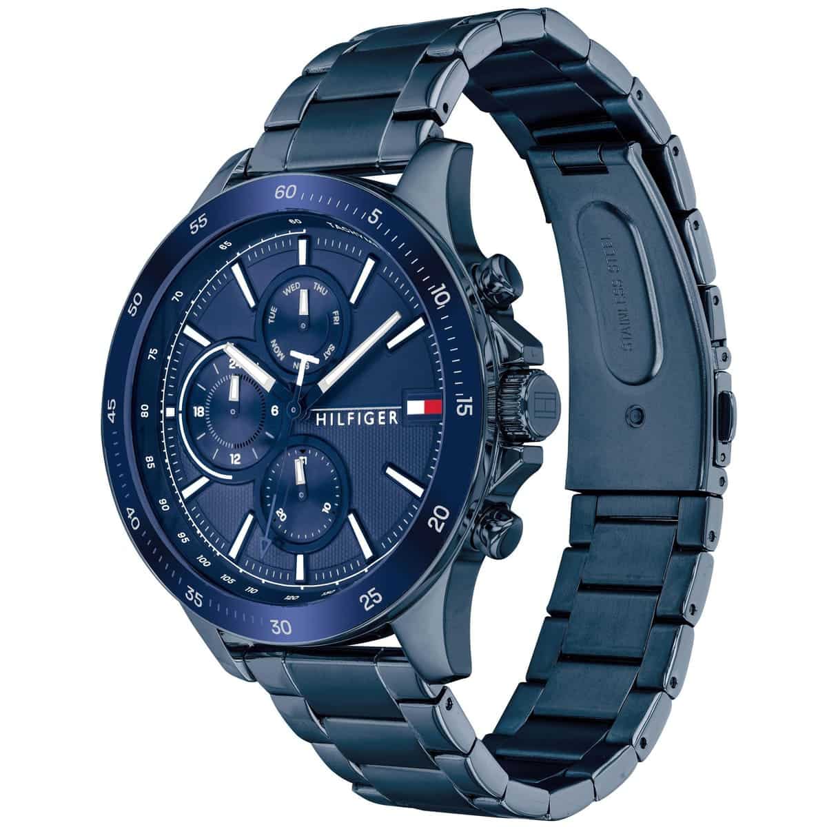 Angled view of Tommy Hilfiger 1791720 highlighting the bold blue tachymeter bezel and polished case