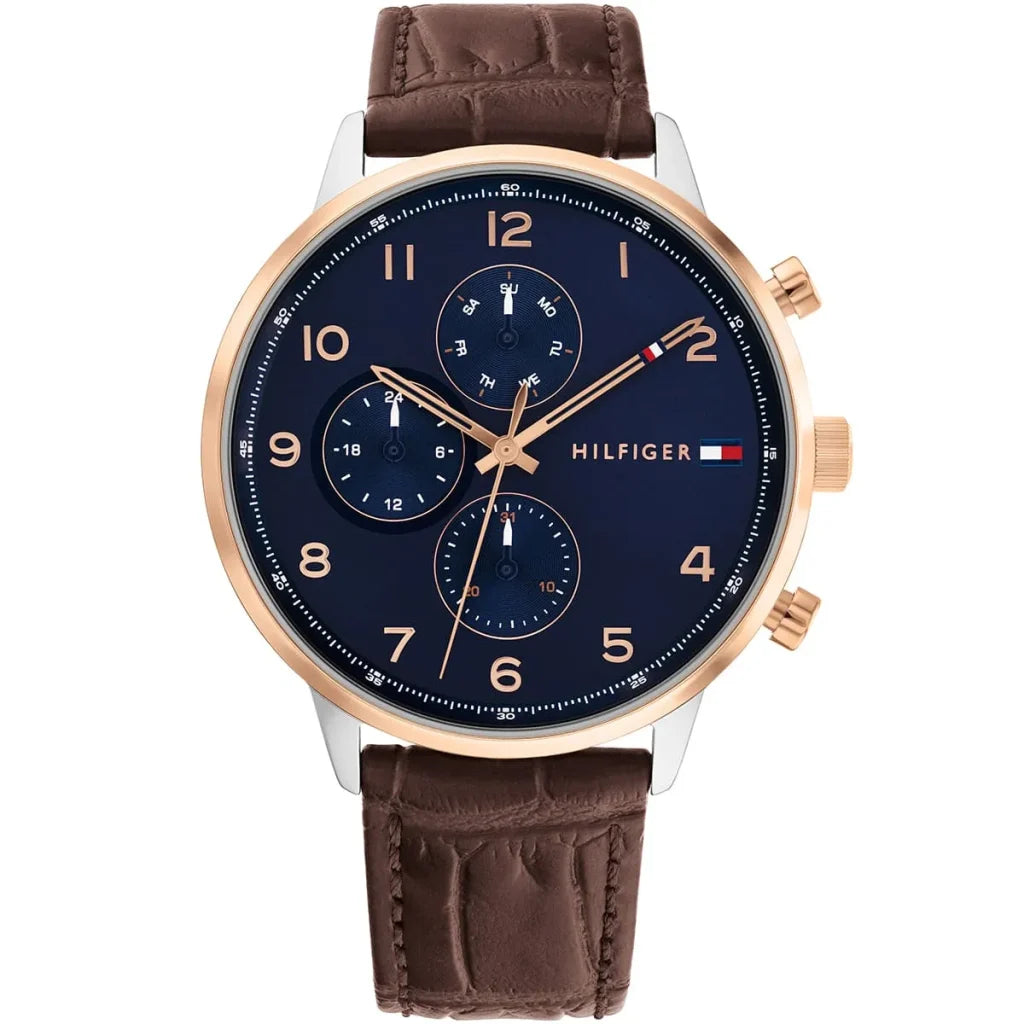 Close up shot of Tommy Hilfiger 1791798 watch on wrist showing the black multifunction dial