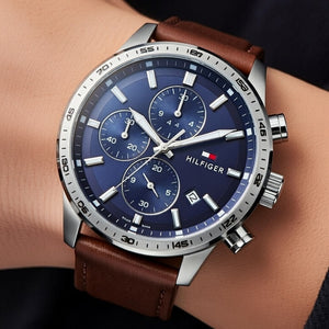 Close up shot of Tommy Hilfiger 1791807 watch on wrist showing the industrial blue dial details