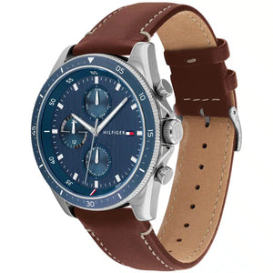 Angled view of Tommy Hilfiger 1791837 highlighting the polished silver case and premium brown leather strap