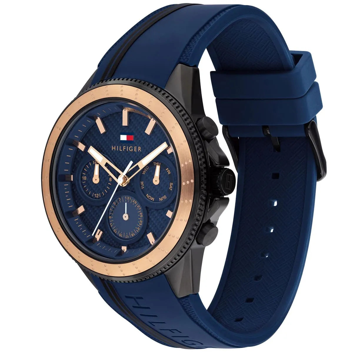 Angled view of Tommy Hilfiger 1791860 highlighting the black and gold case and durable navy blue rubber strap