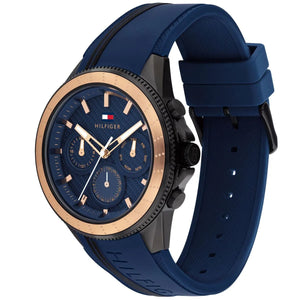 Angled view of Tommy Hilfiger 1791860 highlighting the black and gold case and durable navy blue rubber strap