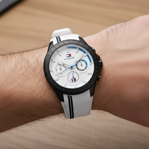 Close up shot of Tommy Hilfiger 1791862 watch on wrist showing the white sporty dial