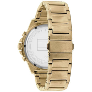 Angled view of Tommy Hilfiger 1791891 highlighting the polished gold case and integrated stainless steel bracelet