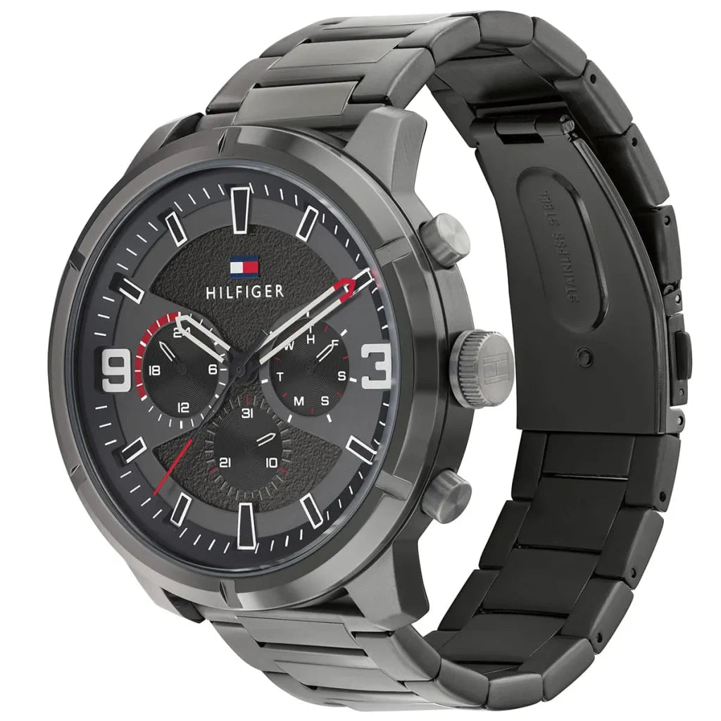 Left side perspective of the gunmetal case and sleek bezel details of the Tommy Hilfiger watch