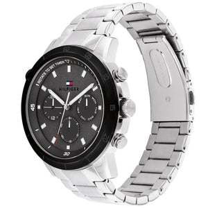 Angled view of the Tommy Hilfiger 1792106 highlighting the black bezel and polished silver-tone case