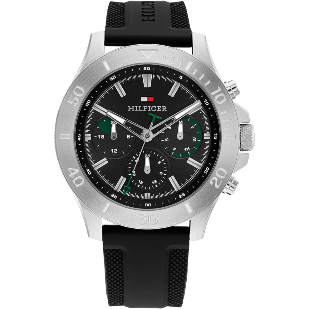 Tommy Hilfiger Bryan 1792111 men's watch with silver case, black dial with green accents, and black rubber strap