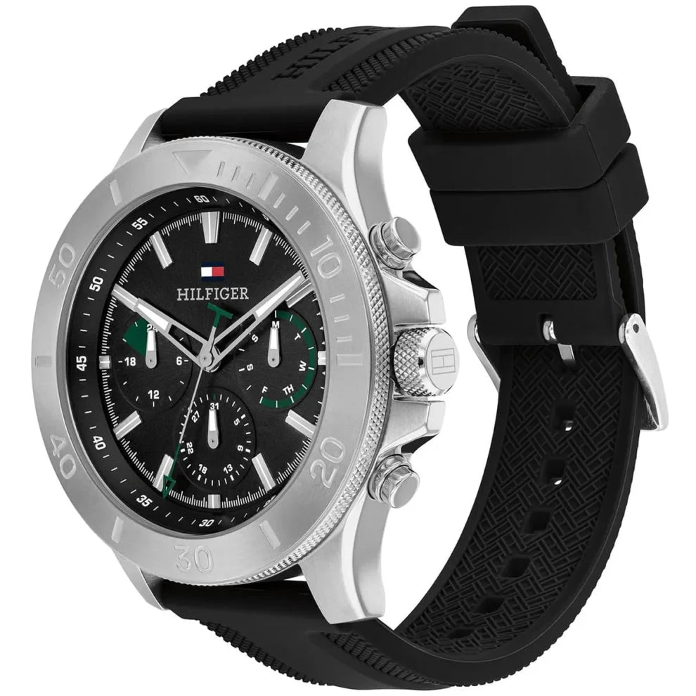 Tommy Hilfiger Bryan 1792111 men's watch with silver case, black dial with green accents, and black rubber strap