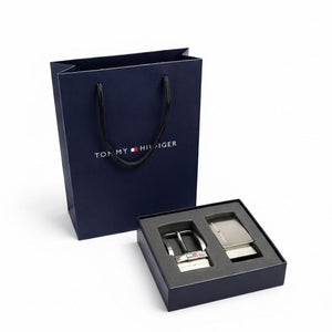 Close up of two interchangeable Tommy Hilfiger belt buckles: Metal Plaque and Classic Prong