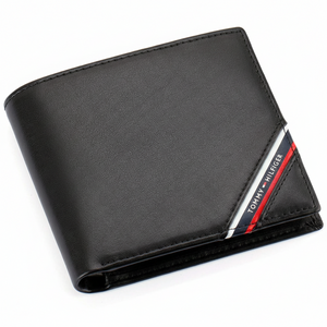 Authentic Tommy Hilfiger men's bifold wallet crafted from premium black leather featuring the iconic diagonal stripe flag logo and sleek smooth finish