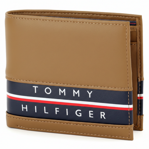 Professional studio shot of the Tommy Hilfiger men's tan leather bifold wallet with the signature navy blue branding stripe