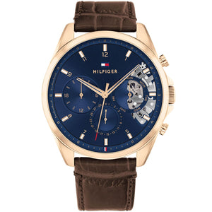 Tommy Hilfiger Baker 1710453 men's watch with rose gold-tone case, blue dial, and brown leather strap