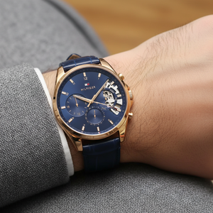 Close up of navy blue skeleton dial showing inner movement of Tommy Hilfiger 1791451