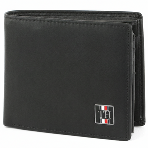 High-detail close-up of the durable Saffiano leather texture and the iconic small enamel flag logo on a Tommy Hilfiger black wallet