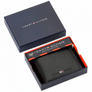Tommy Hilfiger wallet in an open box on a white background