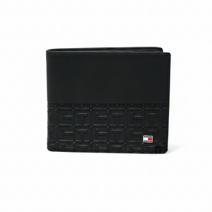 Front view of Tommy Hilfiger black wallet featuring smooth leather top and geometric monogram embossed bottom with small flag logo