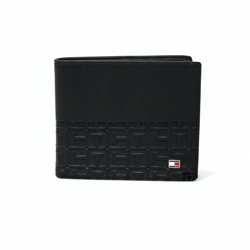 Front view of Tommy Hilfiger black wallet featuring smooth leather top and geometric monogram embossed bottom with small flag logo