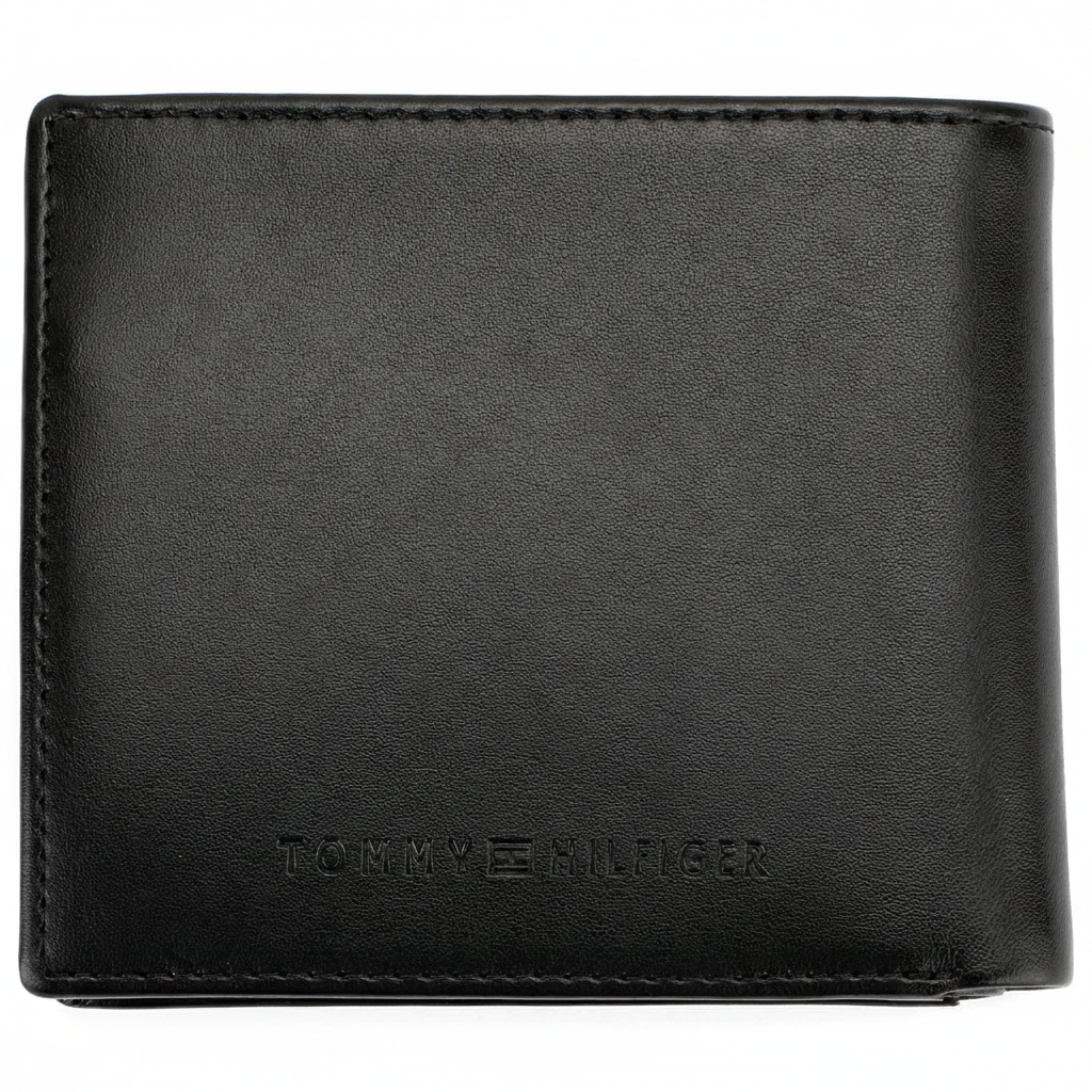 Rear view of Tommy Hilfiger black smooth leather wallet showing premium stitching and embossed brand name at the bottom