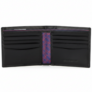 Interior view of the Tommy Hilfiger black leather bifold wallet showcasing multiple card slots and a stylish red and blue patterned fabric lining