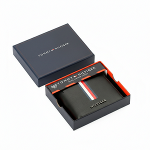 Tommy Hilfiger black leather wallet with vertical tricolor signature stripe and metal Hilfiger logo inside official gift box