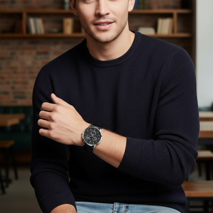 Man wearing elegant Tommy Hilfiger Brad 1710391 watch with black leather strap